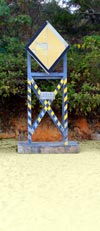 submarine_cable_marker_on_beach